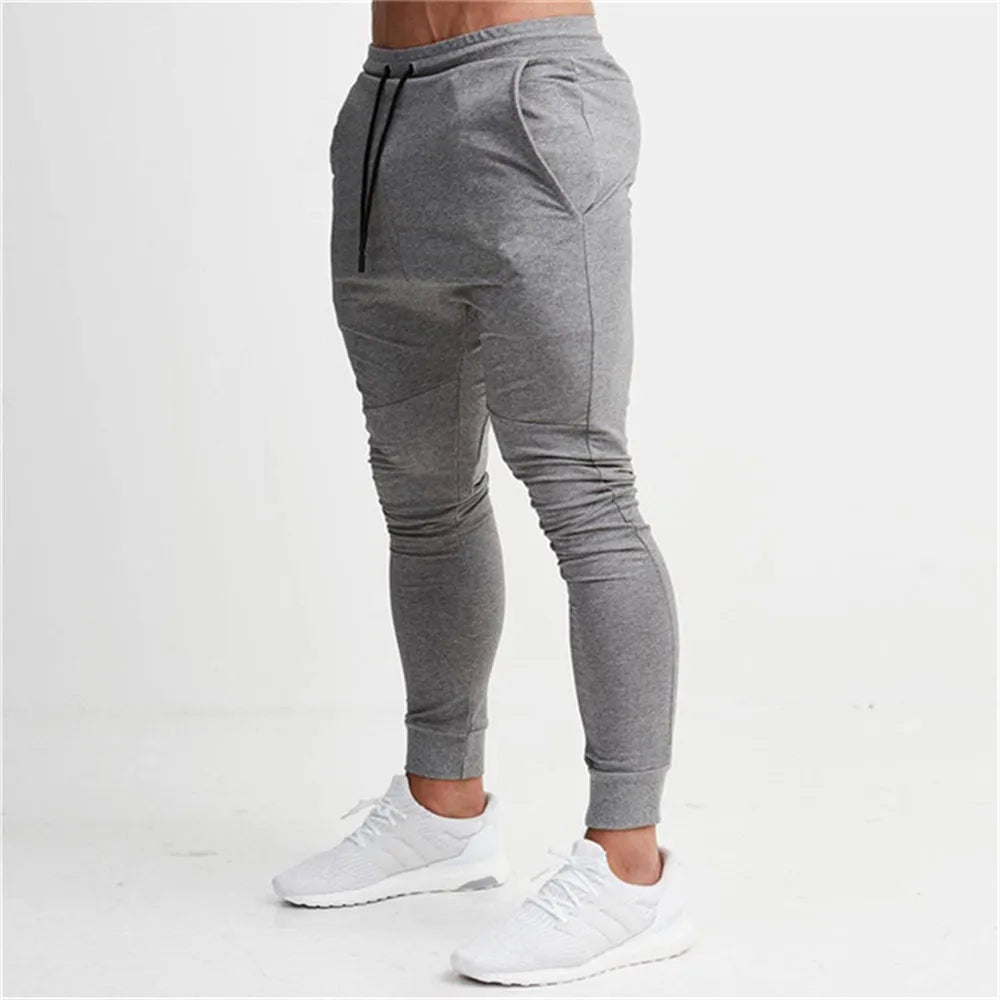 2022 Fashion Men Gyms Pure color Pants Joggers Fitness Casual Long Pants Men Workout Skinny Sweatpants Jogger Tracksuit Trousers