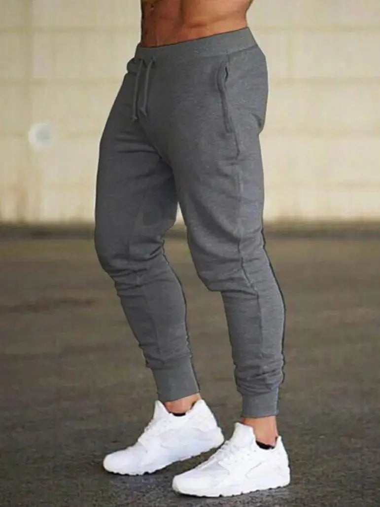 2022 Fashion Men Gyms Pure color Pants Joggers Fitness Casual Long Pants Men Workout Skinny Sweatpants Jogger Tracksuit Trousers